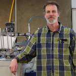 Dale Banks stands in his production facility in Kachemak City on Monday, April 28. (Chloe Pleznac/Homer News)