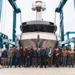 Bay Weld Boats employees gather in front of their newly-built shallow draft limit seiner prior to its launch in April 2025. Photo courtesy of Matt Lowber