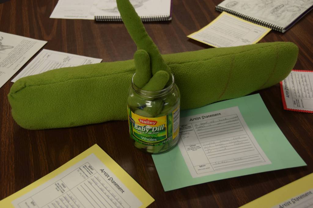 Caden Bices felt pickle art on display Friday, May 2, 2025, at Homer Flex High School during their open house, First Friday event showcasing student art, in Homer, Alaska. (Chloe Pleznac/Homer News)