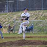 A Homer Mariner prepares for a throw to Kodiak on Friday, May 2 at Homer High School athletic fields. (Chloe Pleznac/Homer News)