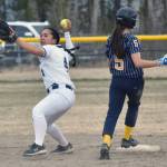 Soldotnas Isabelle Cruz forces out Homers Natalie Farren on Monday, May 5, 2025, at the Soldotna Little League fields in Soldotna, Alaska. (Photo by Jeff Helminiak/Peninsula Clarion)