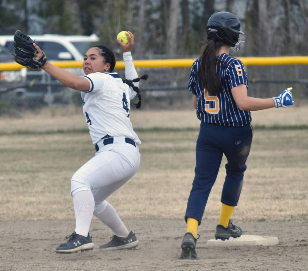 Soldotnas Isabelle Cruz forces out Homers Natalie Farren on Monday, May 5, 2025, at the Soldotna Little League fields in Soldotna, Alaska. (Photo by Jeff Helminiak/Peninsula Clarion)