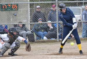 Homers Jessica Plumlee hits a grounder against Soldotna on Monday, May 5, 2025, at the Soldotna Little League fields in Soldotna, Alaska. (Photo by Jeff Helminiak/Peninsula Clarion)