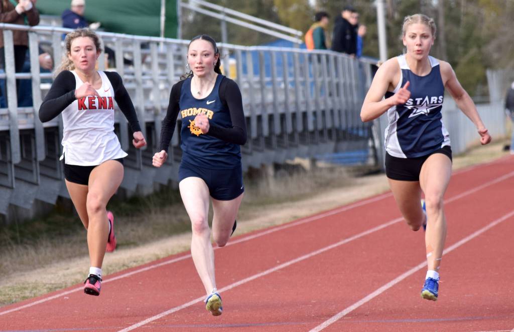 Soldotnas Sarah Brown wins the 100-meter dash in front of Kenai Centrals Sophie Tapley and Homers Molly Evans at the SoHi Invite on Saturday, May 3, 2025, at Soldotna High School in Soldotna, Alaska. (Photo by Jeff Helminiak/Peninsula Clarion)