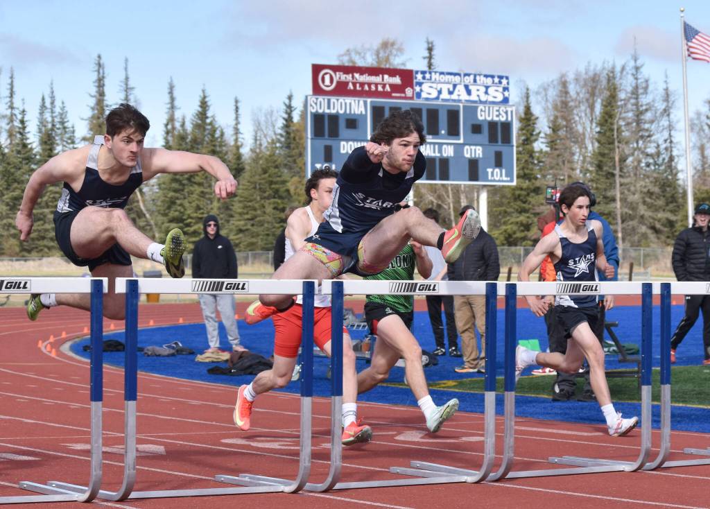 Soldotnas William Klein and Wyatt Faircloth compete in the 110-meter hurdles at the SoHi Invite on Saturday, May 3, 2025, at Soldotna High School in Soldotna, Alaska. (Photo by Jeff Helminiak/Peninsula Clarion)