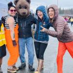 Community members and SPH staff pose with Beary the Be Well Bear during the 2024 Safe and Healthy Kids Fair in the Homer High School parking lot. (Photo courtesy of South Peninsula Hospital)