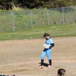 Chugiaks Maddison Stout prepares to pitch on Friday, May 9 during the Bash on the Bay at Jack Gist Park in Homer, Alaska. (Chloe Pleznac/Homer News)