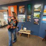 Ashley Story is photographed at her exhibit opening during First Friday, May 2, 2025, at the Art Shop Gallery in Homer, Alaska. Photo provided by Ashley Story