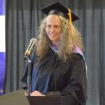 Michelle Waclawski, Alaska adult education coordinator for Kachemak Bay Campus, presents high school equivalency diplomas at the 55th annual commencement ceremony on Wednesday, May 7, 2025, at Kachemak Bay Campus in Homer, Alaska. (Delcenia Cosman/Homer News)