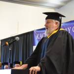Kachemak Bay Campus director Brian Partridge addresses graduates and their friends and families gathered in the audience at the 55th annual commencement ceremony on Wednesday, May 7, 2025, at Kachemak Bay Campus in Homer, Alaska. (Delcenia Cosman/Homer News)
