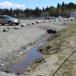 Culverts line the newly redone parking lot at Jack Gist Park on Tuesday, May 13, 2025 in Homer, Alaska. (Chloe Pleznac/Homer News)