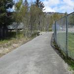 The newly reinforced, smooth path to the disc golf course on Tuesday, May 13, 2025 in Homer, Alaska. (Chloe Pleznac/Homer News)