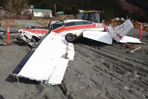 The wreckage of Smokey Bay Air plane N91025 is photographed after residents pulled it from the water before high tide on April 28, 2025, in Nanwalek, Alaska. (Photo courtesy of NTSB)