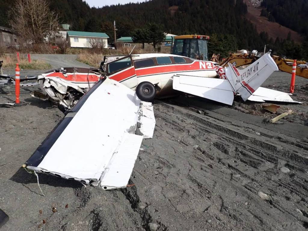 The wreckage of Smokey Bay Air plane N91025 is photographed after residents pulled it from the water before high tide on April 28, 2025, in Nanwalek, Alaska. (Photo courtesy of NTSB )