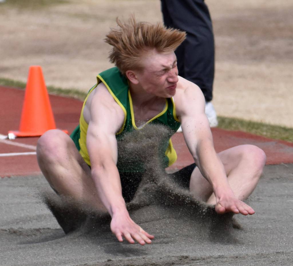 Sewards Olin Liljemark finishes fourth in the long jump Saturday, May 17, 2025, at the Kenai Peninsula Borough meet at Ed Hollier Field at Kenai Central High School in Kenai, Alaska. (Photo by Jeff Helminiak/Peninsula Clarion)