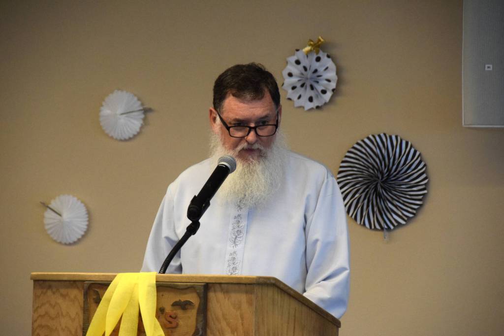 Michael Wojciak, principal of Voznesenka and Kachemak-Selo schools, speaks to the graduates and their families at the commencement ceremony held Monday, May 19, 2025, at Lands End Resort in Homer, Alaska. (Delcenia Cosman/Homer News)