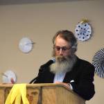 Voznesenka School teacher Michael Houghton speaks to the graduating class during the commencement ceremony held Monday, May 19, 2025, at Lands End Resort in Homer, Alaska. (Delcenia Cosman/Homer News)