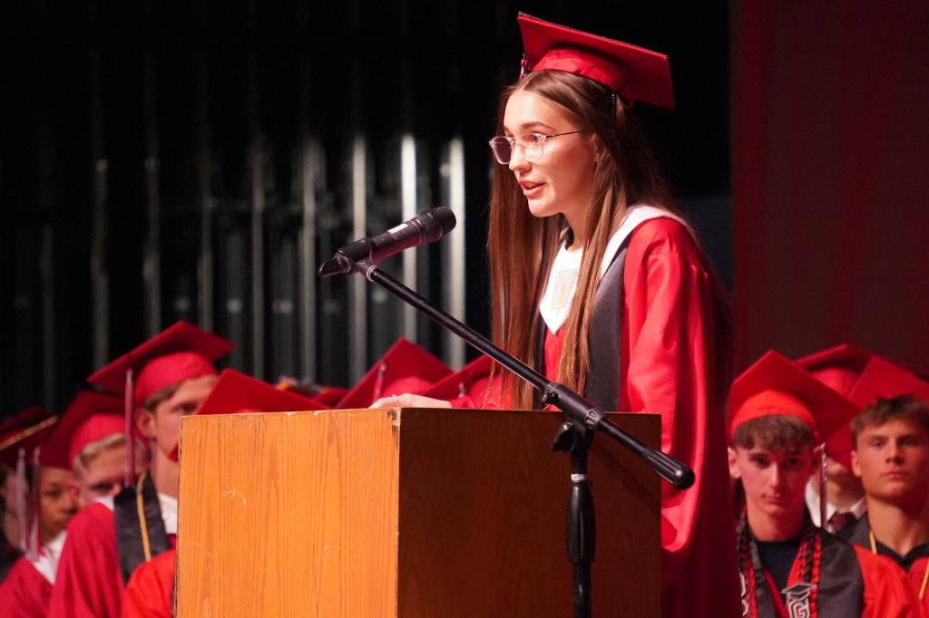 Salutatorian Grace Kahn speaks during the Kenai Central High School graduation ceremony in Kenai, Alaska, on Tuesday, May 20, 2025. (Jake Dye/Peninsula Clarion)