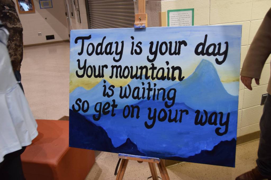 A sign posted outside the Alice Witte Gymnasium during the 2025 Homer High School graduation ceremony on Wednesday, May 21. (Chloe Pleznac/Homer News)