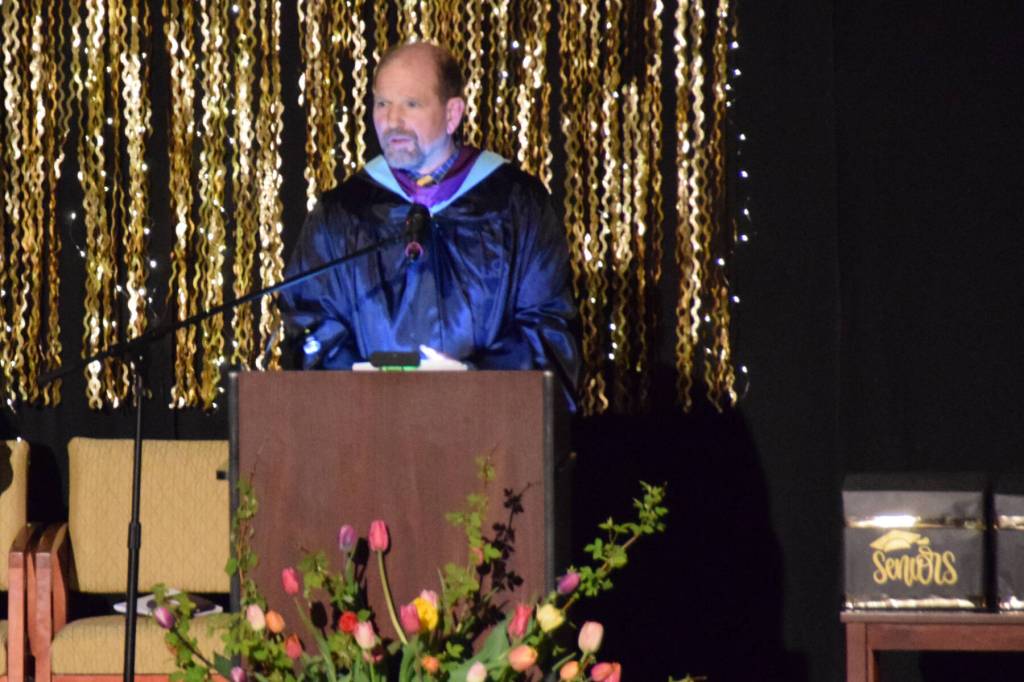 Principal Douglas Waclawski addresses the crowd during the 2025 Homer High School graduation ceremony on Wednesday, May 21, 2025, in the Alice Witte Gymnasium. (Chloe Pleznac/Homer News)