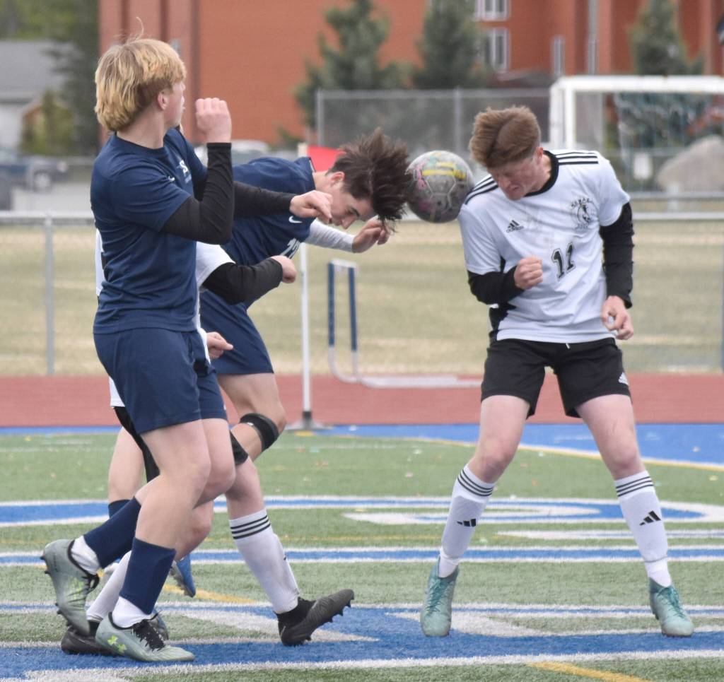 Soldotnas Lane Hillyer and Kenai Centrals Gavin Liles joust for the ball Thursday, May 22, 2025, at Justin Maile Field at Soldotna High School in Soldotna, Alaska. (Photo by Jeff Helminiak/Peninsula Clarion)