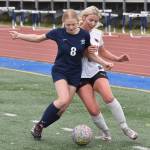 Soldotnas Keely Sundberg and Kenai Centrals Brynnen Hanson battle for the ball Thursday, May 22, 2025, at Justin Maile Field at Soldotna High School in Soldotna, Alaska. (Photo by Jeff Helminiak/Peninsula Clarion)