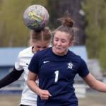 Soldotna's Mia Hannevold heads in a goal on a corner kick Thursday, May 22, 2025, at Justin Maile Field at Soldotna HIgh School in Soldotna, Alaska. (Photo by Jeff Helminiak/Peninsula Clarion)
