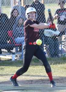 Kenai Centrals Caitlyn Crapps hits the ball against Palmer on Friday, May 23, 2025, at Steve Shearer Memorial Ball Park in Kenai, Alaska. (Photo by Jeff Helminiak/Peninsula Clarion)