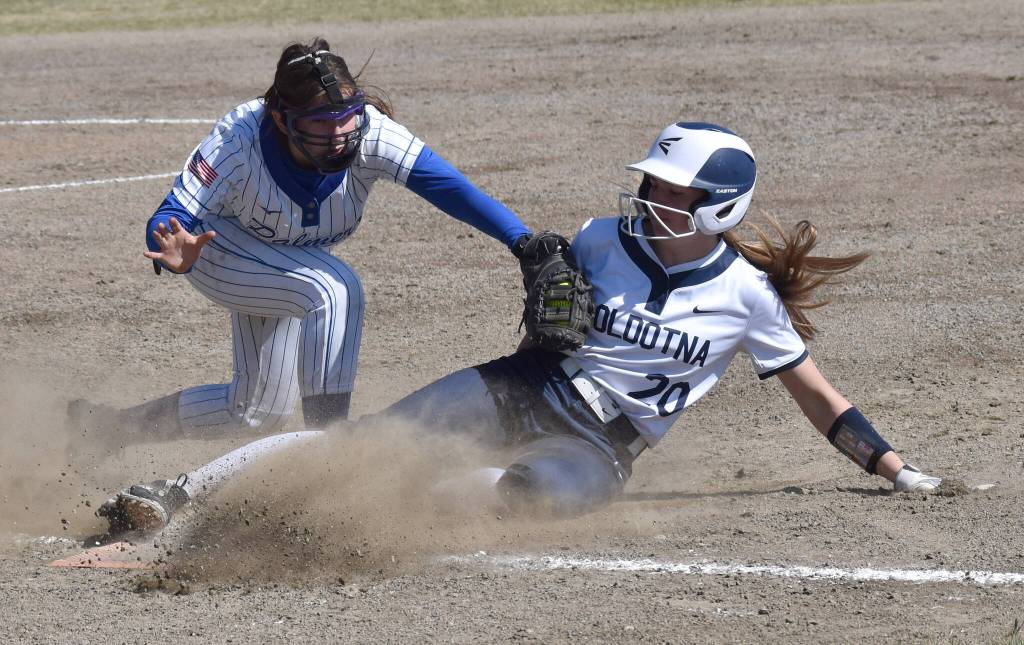 Soldotnas Aliya Blough gets back to first ahead of the tag of Palmers Rylei Doyle on Saturday, May 24, 2025, at the Soldotna Little League fields in Soldotna, Alaska. (Photo by Jeff Helminiak/Peninsula Clarion)