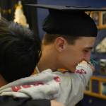 Students celebrate after a graduation ceremony for Connections Homeschool in Soldotna, Alaska, on Thursday, May 22, 2025. (Jake Dye/Peninsula Clarion)