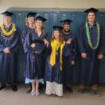 (from left to right) Ira Iwerks, Marcus Hunt, Isabell Hooton, Grace Kaiser, Michael Nalewako and Max Russell graduated from Ninilchik School on Tuesday, May 20, 2025, in Ninilchik, Alaska. Photo courtesy of Mattea Williamson