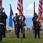 VFW Post 10221 member Eric Henley performs the battlefield cross during a Memorial Day ceremony held at the Anchor Point Kallman Cemetery on Monday, May 26, 2025, near Anchor Point, Alaska. (Delcenia Cosman/Homer News)