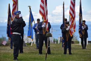 VFW Post 10221 member Eric Henley performs the battlefield cross during a Memorial Day ceremony held at the Anchor Point Kallman Cemetery on Monday, May 26, 2025, near Anchor Point, Alaska. (Delcenia Cosman/Homer News)