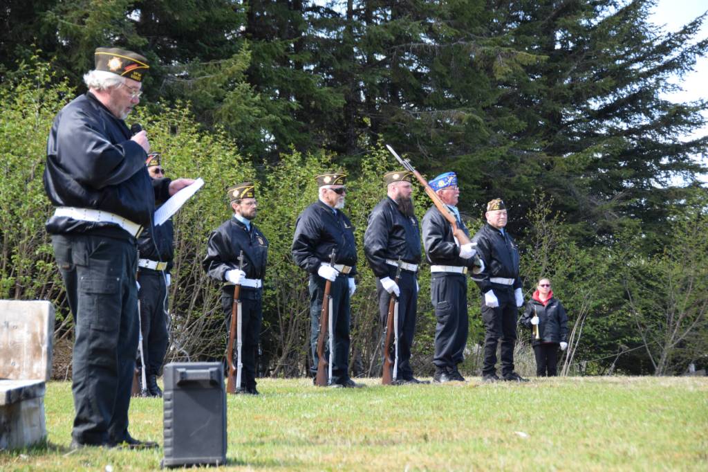 VFW Post 10221 Cmdr. Chuck Collins (left) gives a speech to those gathered in honor of fallen service members during a Memorial Day ceremony at the Anchor Point Kallman Cemetery on Monday, May 26, 2025, near Anchor Point, Alaska. (Delcenia Cosman/Homer News)