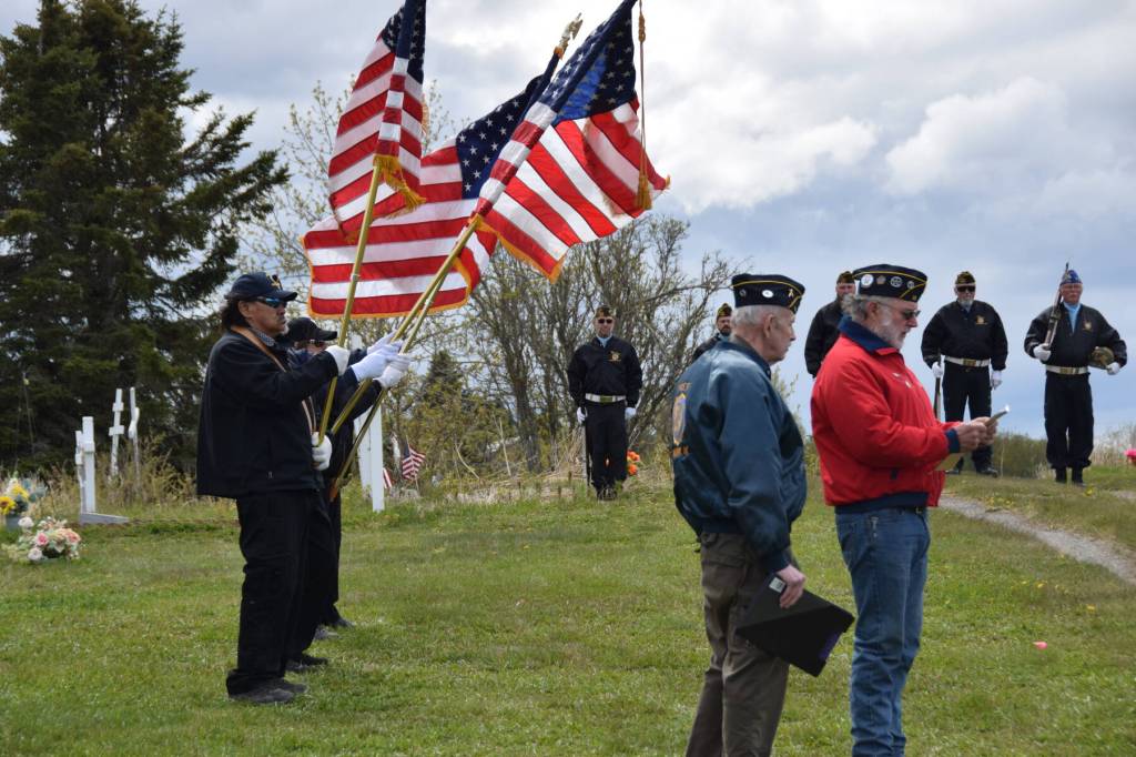 American Legion Post 18 Cmdr. Gary Jackinsky (right) presents his speech to those gathered for a Memorial Day service at the American Legion Cemetery on Monday, May 26, 2025, in Ninilchik, Alaska. (Delcenia Cosman/Homer News)