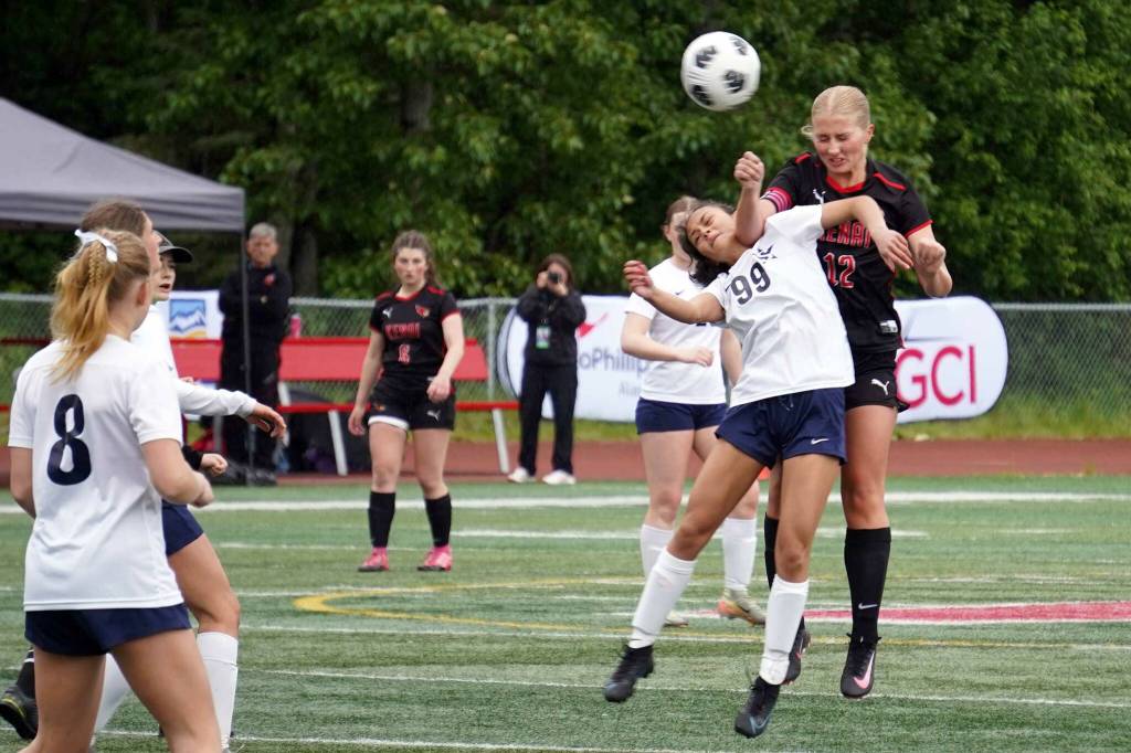 Soldotnas Emma Glassmaker and Kenais Kate Wisnewski leap for the ball during the final match of the ASAA Division II Girls Soccer Championship at Wasilla High School in Wasilla, Alaska, on Saturday, May 31, 2025. (Jake Dye/Peninsula Clarion)