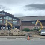 Workers for Steiners North Star Construction demolish the old entrance walkways for Homer High School on Thursday, May 29, 2025, in order to reconstruct them according to a contract awarded by the Kenai Peninsula Borough. This project was funded by the $65 million school improvement bond package approved by voters in 2022. (Delcenia Cosman/Homer News)