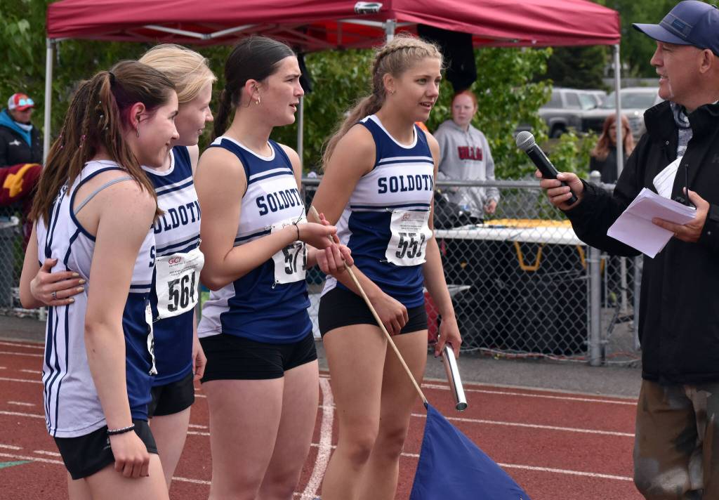 Soldotnas Shiloh Zichko, Sophia Jedlicki, Anaulie Sedivy and Sarah Brown inform the announcer they also set a school record after winning a state title in the 400-meter relay Saturday, May 31, 2025, at the Division I state track meet at Dimond High School in Anchorage, Alaska. (Photo by Jeff Helminiak/Peninsula Clarion)