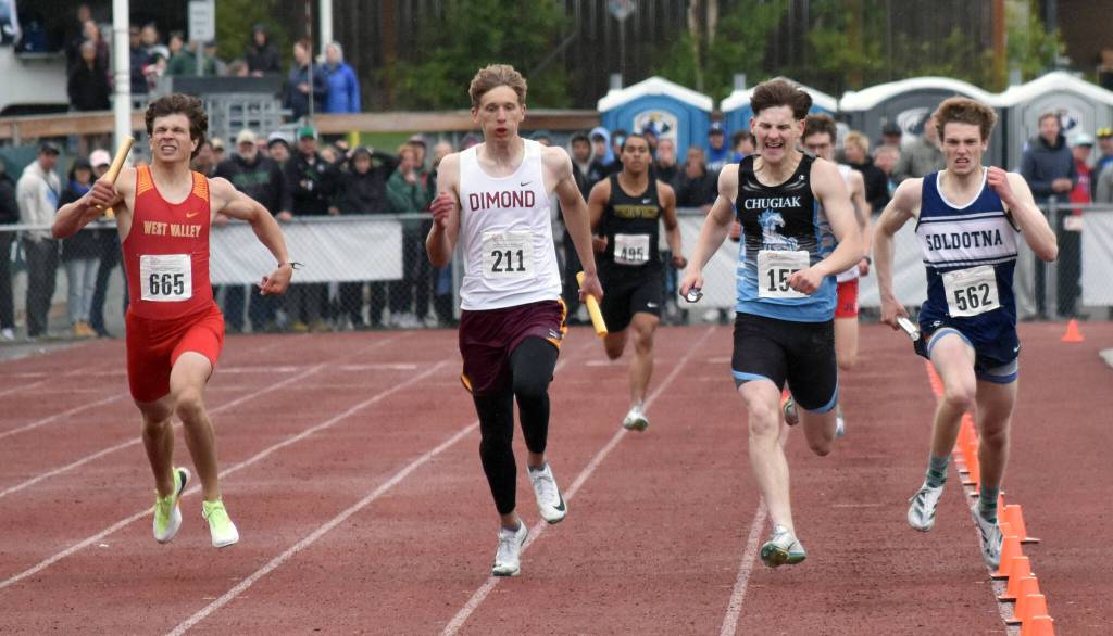 Soldotnas James Innes wins the 1,600-meter relay from, as he called it, Lane 0 on Saturday, May 31, 2025, at the Division I state track meet at Dimond High School in Anchorage, Alaska. West Valley was second in the race, while Chugiak was third. That meant Soldotna and Chugiak tied for the boys team title. (Photo by Jeff Helminiak/Peninsula Clarion)