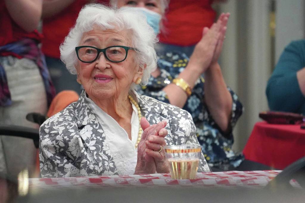 Jake Dye/Peninsula Clarion
Hanna Stormo applauds during her 102nd birthday party at Aspen Creek Senior Living in Soldotna on Friday, May 30.