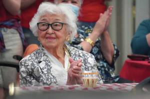 Jake Dye/Peninsula Clarion
Hanna Stormo applauds during her 102nd birthday party at Aspen Creek Senior Living in Soldotna on Friday, May 30.
