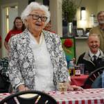 Hanna Stormo speaks during her 102nd birthday party at Aspen Creek Senior Living in Soldotna, Alaska, on Friday, May 30, 2025. (Jake Dye/Peninsula Clarion)