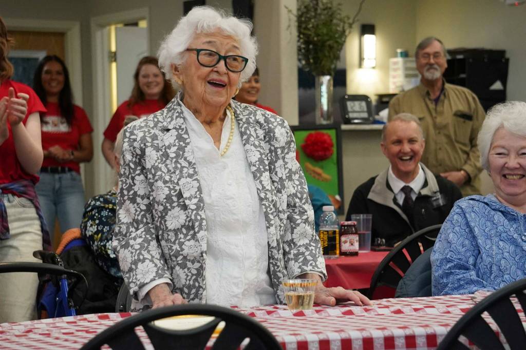 Hanna Stormo speaks during her 102nd birthday party at Aspen Creek Senior Living in Soldotna, Alaska, on Friday, May 30, 2025. (Jake Dye/Peninsula Clarion)