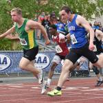 Sewards Ronan Bickling nips Sitkas Calder Prussian for the 100-meter dash title Saturday, May 31, 2025, at the Division II state track meet at Dimond High School in Anchorage, Alaska. (Photo by Jeff Helminiak/Peninsula Clarion)