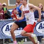 Kenai Centrals Gage Ivy races the 400-meter relay Saturday, May 31, 2025, at the Division II state track meet at Dimond High School in Anchorage, Alaska. Ivy won the triple jump at the meet. (Photo by Jeff Helminiak/Peninsula Clarion)