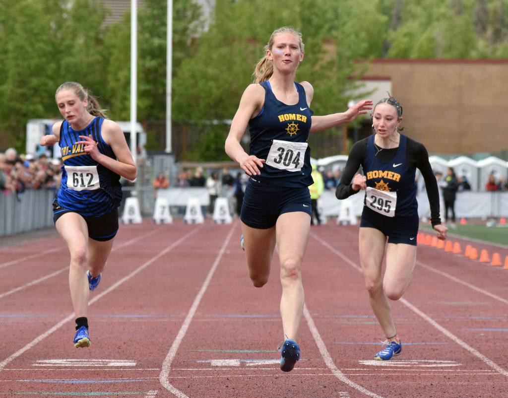 Homers Gracie Miotke wins the 100-meter dash Saturday, May 31, 2025, at the Division II state track meet at Dimond High School in Anchorage, Alaska. (Photo by Jeff Helminiak/Peninsula Clarion)