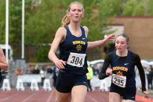 Homer's Gracie Miotke wins the 100-meter dash Saturday, May 31, 2025, at the Division II state track meet at Dimond High School in Anchorage, Alaska. (Photo by Jeff Helminiak/Peninsula Clarion)