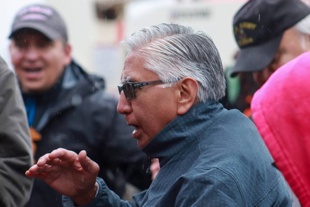 Paul Marks dances in the rain at the Fishermans Honor Totem Pole Ceremony on Friday, May 30, 2025. (Jasz Garrett / Juneau Empire)