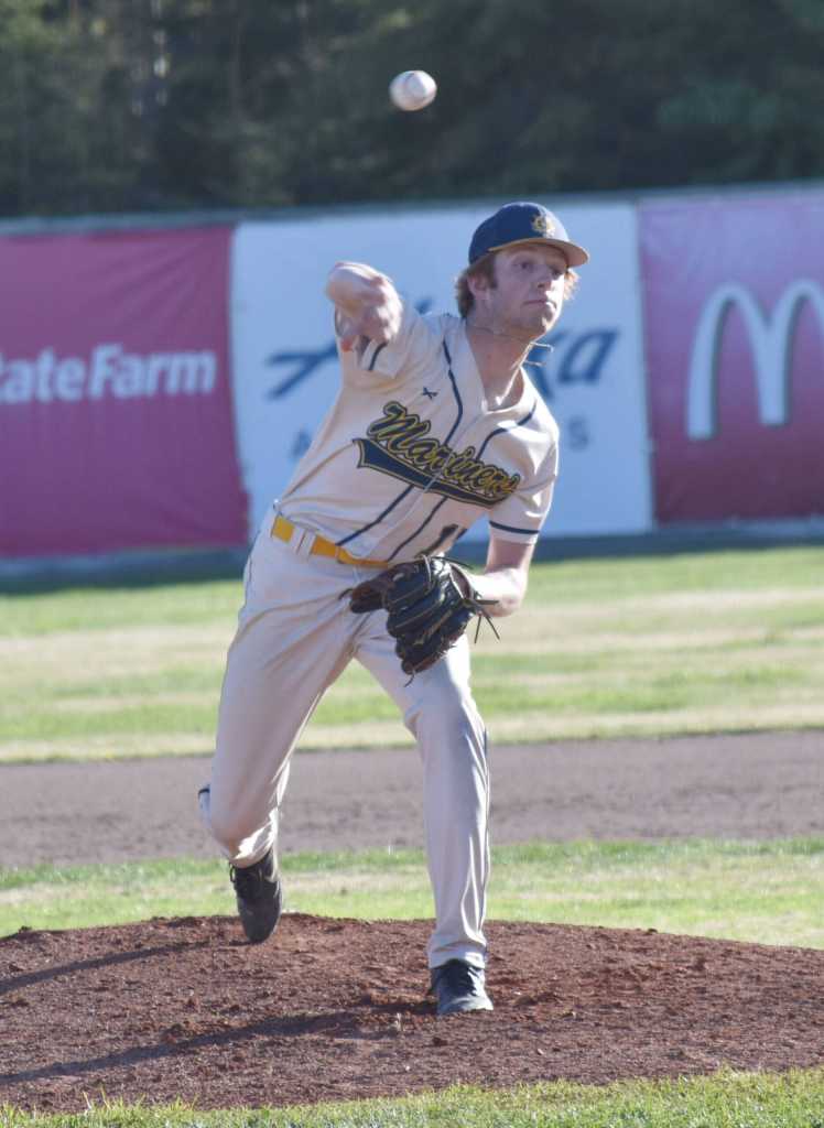 Homers CJ Burns delivers to Kenai Central at the Division II state baseball tournament Thursday, June 6, 2025, at Coral Seymour Memorial Park in Kenai, Alaska. (Photo by Jeff Helminiak/Peninsula Clarion)