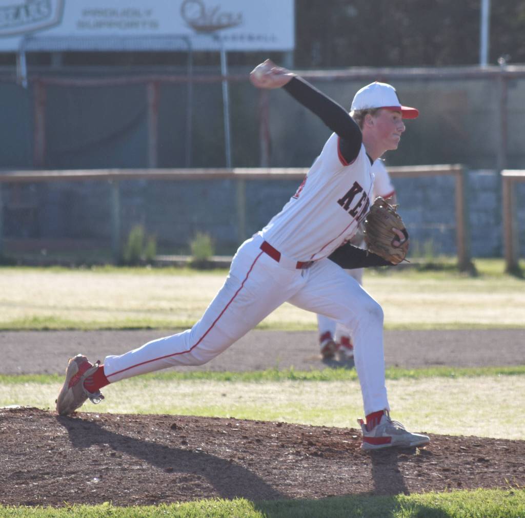 Kenai Centrals Jacob Joanis delivers to Houston at the Division II state baseball tournament Thursday, June 6, 2025, at Coral Seymour Memorial Park in Kenai, Alaska. (Photo by Jeff Helminiak/Peninsula Clarion)